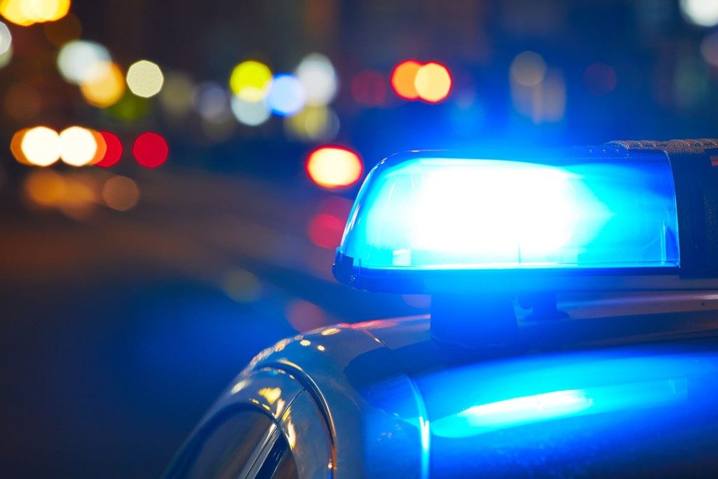 blue light on police car | criminal defense attorneys