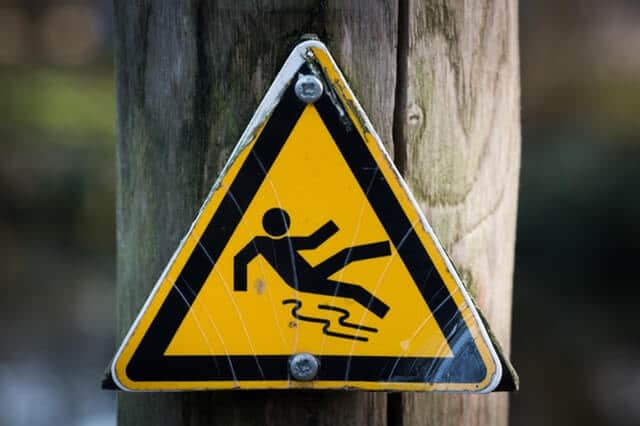 slippery sign | premises liability | personal injury attorneys